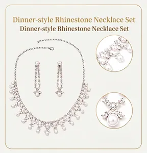 Detailed view of elegant bridal necklace and earring set with crystals and pearls for wedding