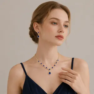 Elegant wedding jewelry set with blue teardrop crystal necklace and earrings for gala