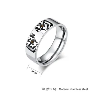 Detail of 7mm stainless steel ring with black tiger animal print and yellow eyes