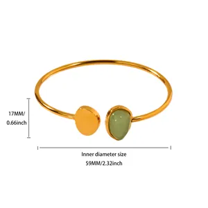 Detailed dimensions of a vintage French style gold open bangle with green stone