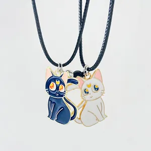 Magnetic heart-shaped couple necklaces featuring cute black and white cat pendants.