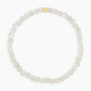 Bohemian natural white stone beaded bracelet with central gold bead accent for women