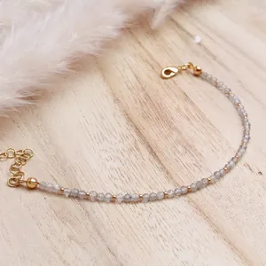 Elegant bohemian natural stone beaded bracelet with gold spacers and extender chain