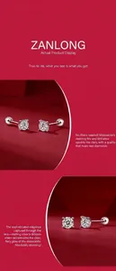 Primer plano de pendientes de plata de ley 925 con brillantes piedras moissanita