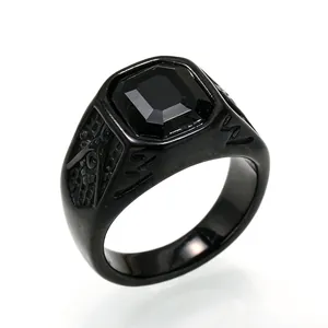 Detail view of men's black titanium steel Freemason ring with square black gemstone