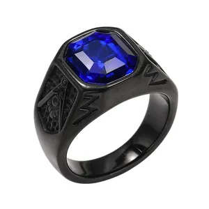 Close-up of men's titanium steel Freemasonry ring with a large blue square crystal
