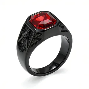 Macro view of men's black titanium steel ring with red stone and Masonic symbol
