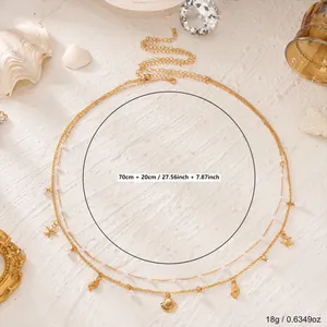 Detailansicht der goldene Muschel-Bauchkette mit 70+20cm Länge und einem Gewicht von 18g.