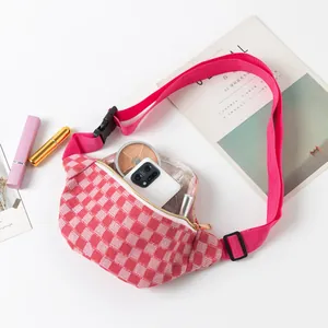 Pink checkered fanny pack with adjustable strap for sports and travel use.