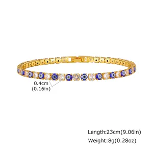 Detailed view of a gold-plated evil eye tennis bracelet with dimension annotations