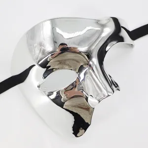 Detailed view of silver chrome phantom of the opera half mask with mirror finish