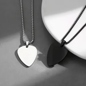 Minimalist stainless steel guitar pick necklace set in polished silver and black finishes