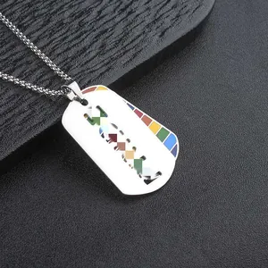 Detailed close-up of a premium stainless steel dog tag pendant featuring vibrant rainbow accents.