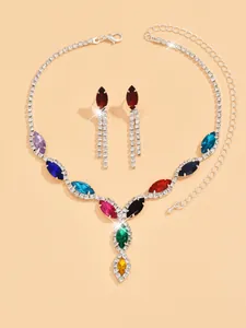 Detailed view of colorful crystal marquise-cut gemstone necklace and earring set