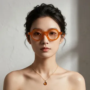 Stylish oversized round orange textured sunglasses with UV protection for modern women