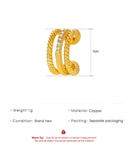 Detailed view of a gold-plated copper ear cuff with zircon inlay and 1cm height marker
