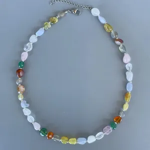 Detailed shot showing colorful irregular natural stones of this vintage necklace