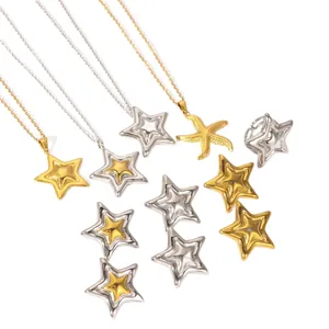 Elegante conjunto de joyas de acero inoxidable con estrellas bicolor oro y plata
