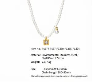 Close-up of pearl necklace with square zircon pendant and shell pearl charm