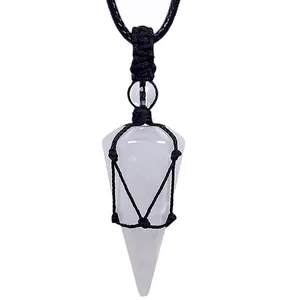 Detail view of a natural crystal pendulum pendant with black hand-woven rope net