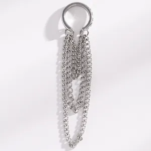 Detailed view of silver minimalist elf ear cuff featuring stylish long chain tassels