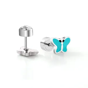 Close-up of mini stainless steel butterfly stud earrings with blue enamel detail