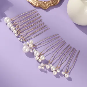 Set di eleganti forcine per capelli con perle bianche e finitura dorata per sposa