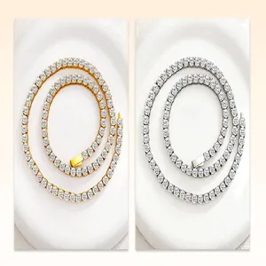 Comparison view of gold and silver titanium steel tennis chains with clear zircon inlay