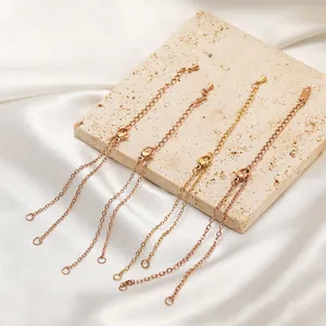 Detailed view of DIY stainless steel bracelet chains with lobster clasps in multiple colors
