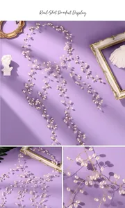 Close-up detail of a long elegant pearl vine hair accessory for bridal styling.