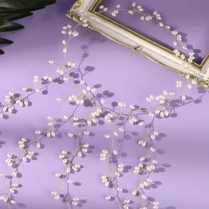 Elegant handmade pearl vine bridal headpiece with delicate gold wire for wedding hair