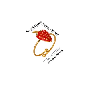 Dimension detail of a red enamel strawberry stainless steel adjustable open ring.