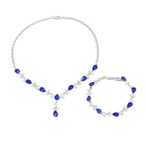 Elegant silver leaf jewelry set with pear-cut blue zircon necklace and bracelet