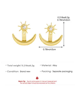 Detail of gold star and crescent moon ear jacket earrings with size and weight specs.