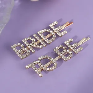 Barrettes élégantes en alliage doré avec lettrage BRIDE et TO BE en strass pour mariage.