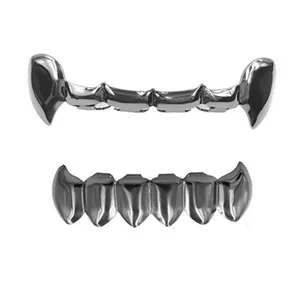 Silver-tone hip hop grillz set with vampire fangs and textured surface for cosplay