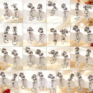 Titanium steel stud earrings set featuring silver stars, hearts, and various shapes