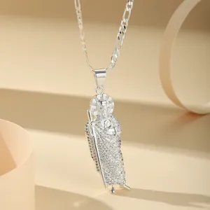 Close-up detail of silver Saint Jude pendant with micro-pave cubic zirconia stones