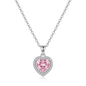 Elegante collar con colgante de corazón plateado, piedra rosa y halo de cristales