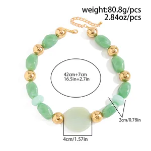 Detailed view of chunky green resin bead necklace with gold accents and size measurements.