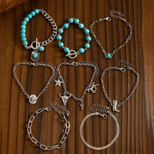 8-teiliges Armband-Set im Western-Cowboy-Stil mit Türkisperlen und Legierungsanhängern