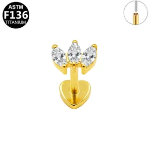 Detail view of ASTM F136 titanium labret stud with three marquise-cut CZ stones.