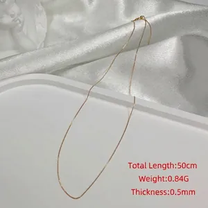 Detail of minimalist S925 silver gold-plated box chain necklace with 50cm length