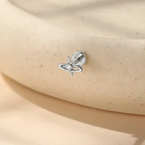 Macro detail of S925 sterling silver planet star stud earring for 16G cartilage piercing