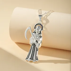 Close-up of Grim Reaper pendant necklace with black zircon stones and scythe detail