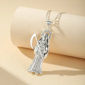 Detail view of a silver Grim Reaper pendant necklace with glittering white zirconia stones.