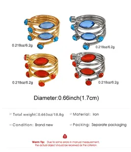 Detail view of multi-layer adjustable rings with blue and red stones in two finishes.