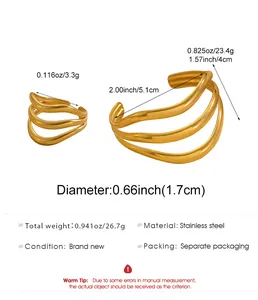 Detailed measurements of geometric gold cuff bracelet and matching wavy ring set