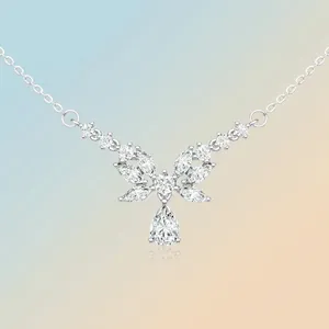 Elegant silver Moissanite necklace featuring a butterfly pendant with a pear cut drop