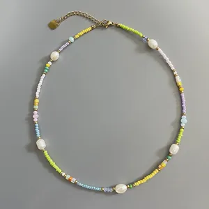 Detail of Bohemian colorful seed bead necklace with natural irregular freshwater pearls